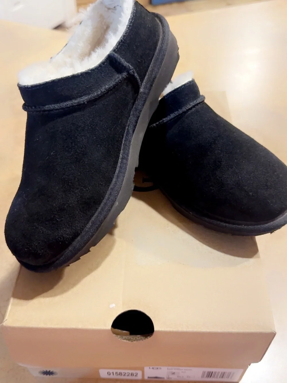 UGG Kids Black Suede Slip-On Clog with Shearling Trim